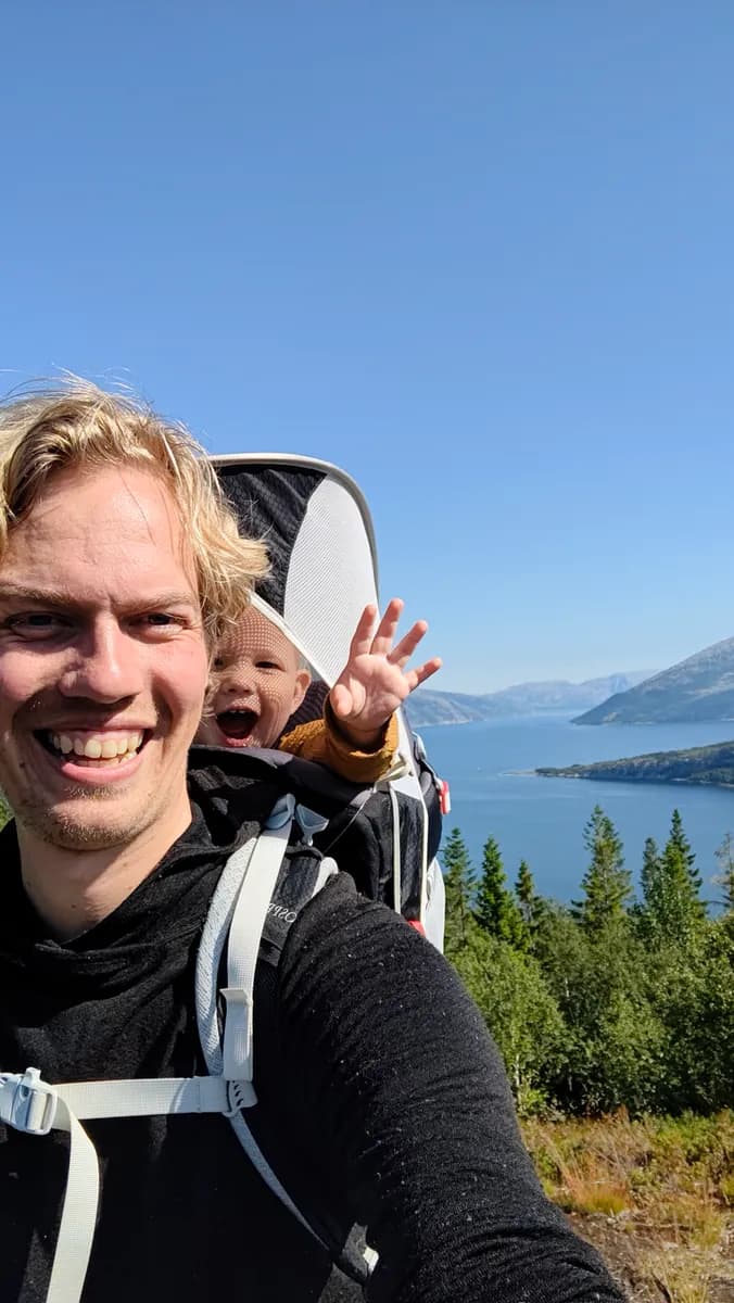 Mads hiking by a Norwegian fjord