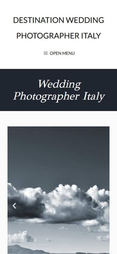 The old site on mobile: the title, a menu and the top of a black-and-white image of clouds.